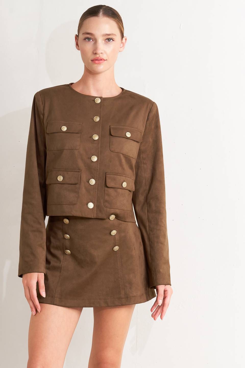 A faux suede cropped jacket & skort Set